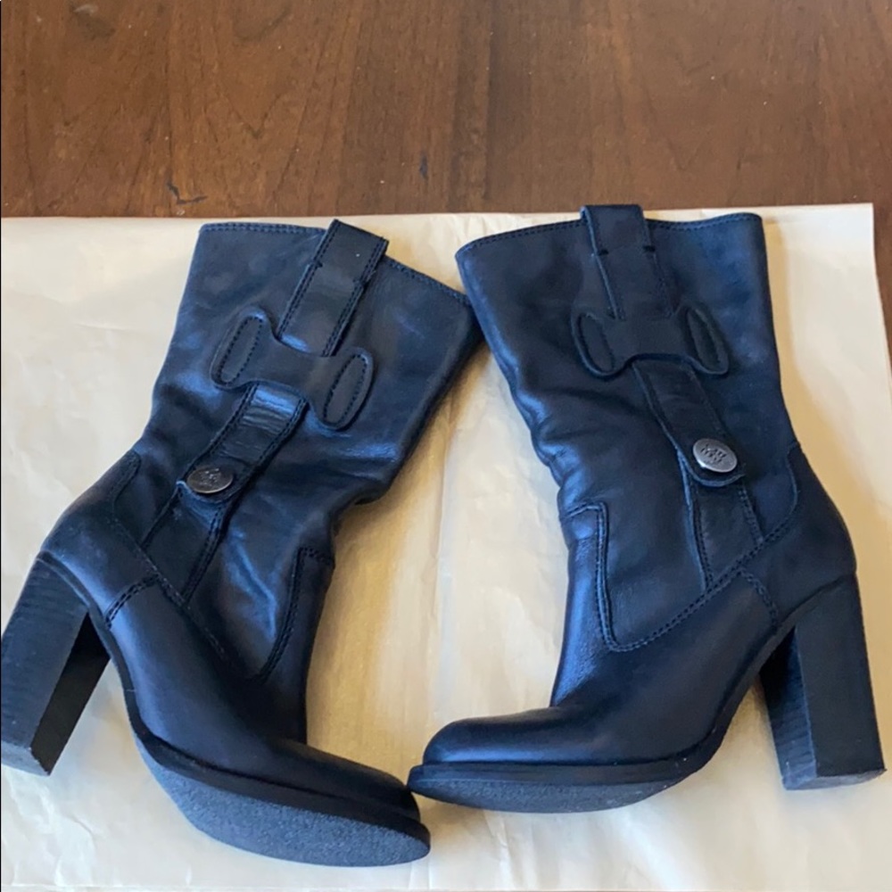 05:08 - BCBG Generation Leather Moto Boots